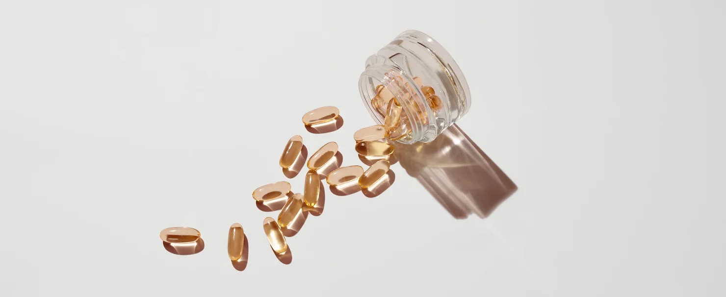 longevity supplement spilling out of bottle