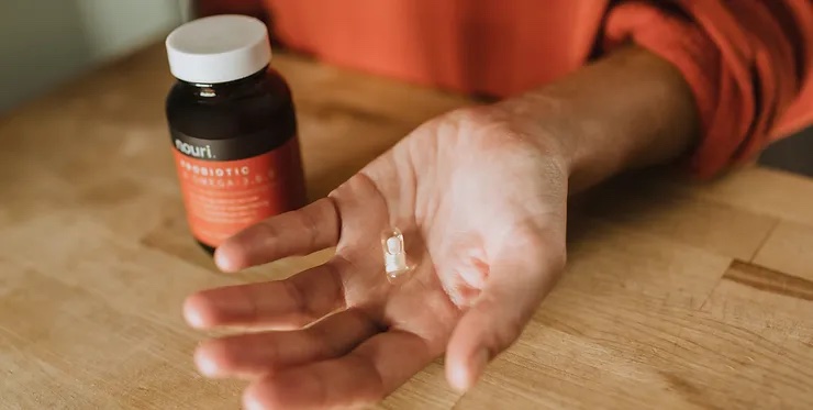 person taking supplement for a clinical trial